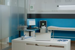 Empty doctors office with medical instruments at facility